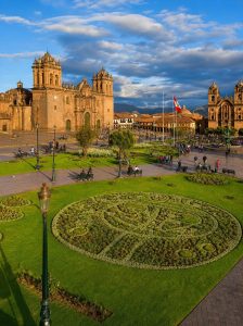 Historic Plaza de Armas with Cusco Cathedral and landscaped gardens in the heart of Cusco, Peru.