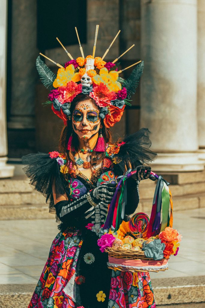 Woman dressed as La Catrina during Día de los Muertos in Oaxaca Mexico