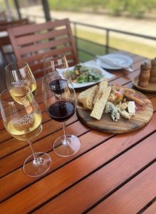 Wine tasting and charcuterie lunch served on a terrace overlooking Monsoon Valley Vineyard.