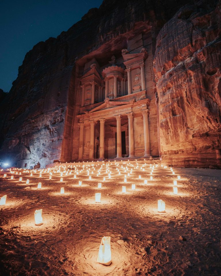 The Treasury at Petra illuminated by hundreds of candles during the Petra by Night experience.