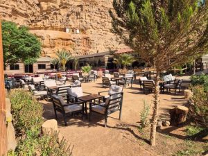 Outdoor courtyard and seating area at a luxury glamping resort in Wadi Rum, Jordan.