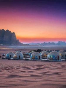Luxury dome accommodation at Hasan Zawaideh Camp at sunset in Wadi Rum, Jordan
