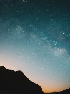 The Milky Way shines above the sandstone mountains of Wadi Rum under one of Jordan's darkest night skies.