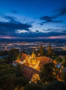 Wat Phra That Doi Suthep temple overlooking Chiang Mai at dusk